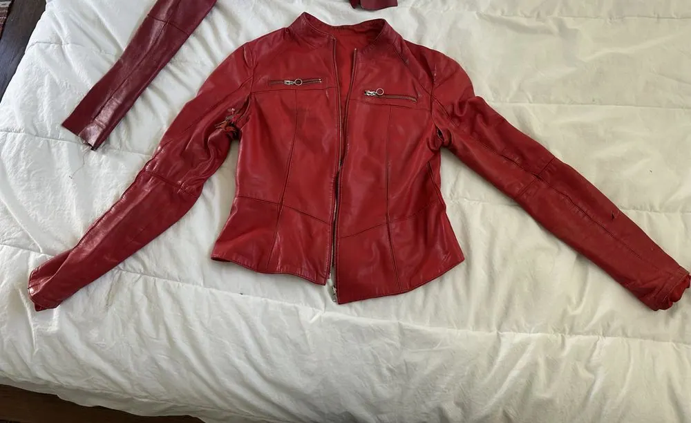 A short red leather jacket in for repair