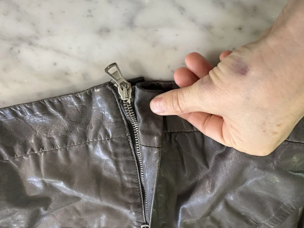 A Helmut Lang grey leather jacket in for a new zipper