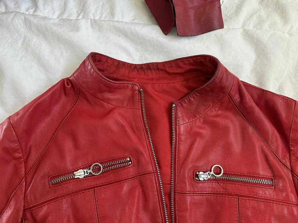 The collar of a red leather jacket after cleaning