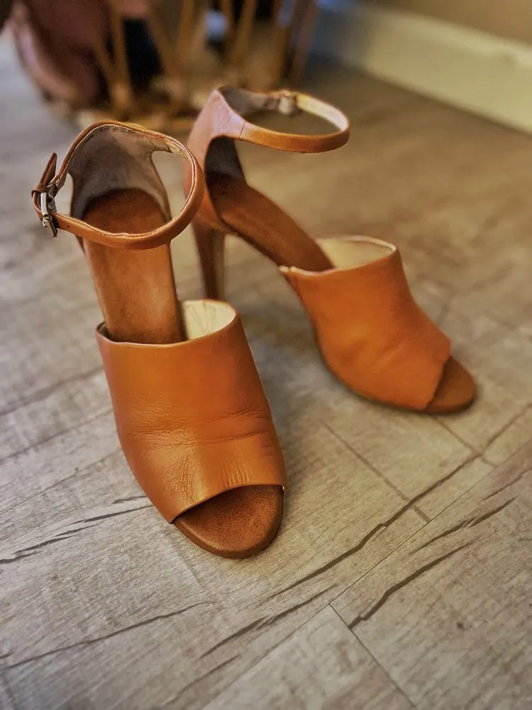 Cognac leather heels rebuilt after dry rot