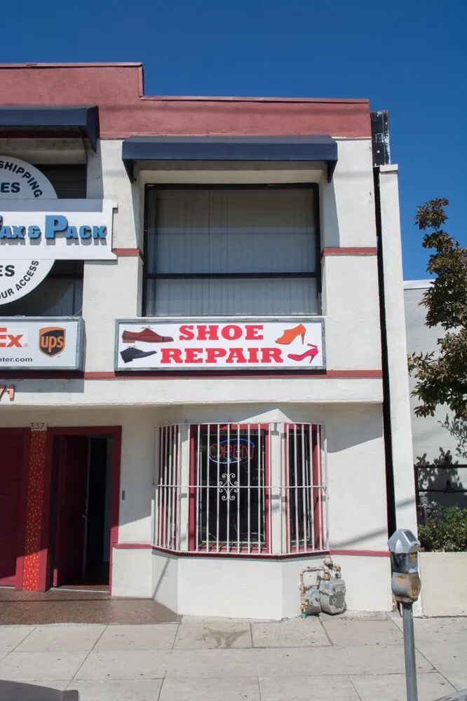 Shelves of repaired shoes waiting for pickup at Robert's Shoe Repair