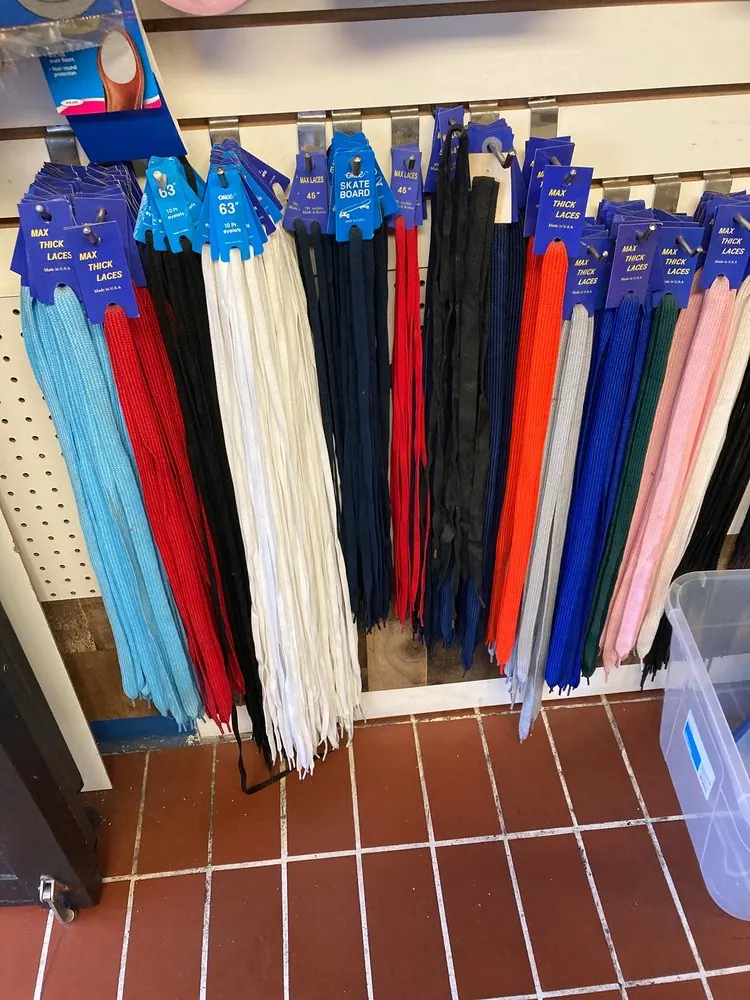 Racks of replacement shoe laces in every color