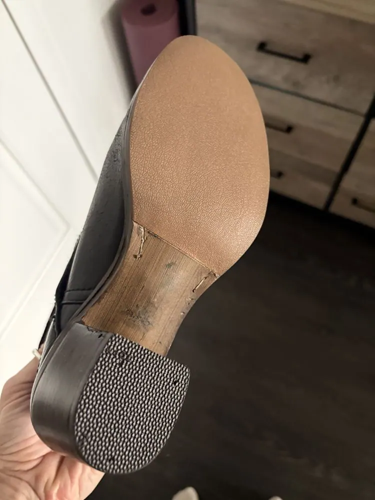 A boot with a new sole and a rebuilt heel